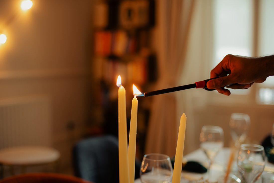 Lighting the candles before guests arrive