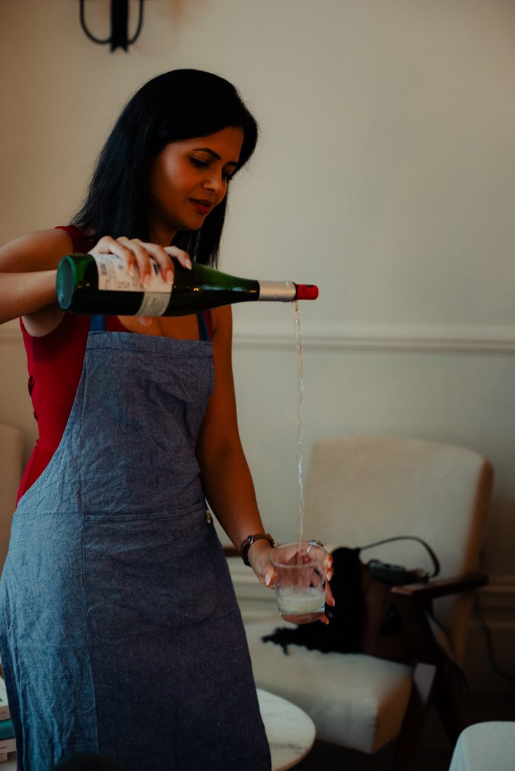 Pouring wine for guests