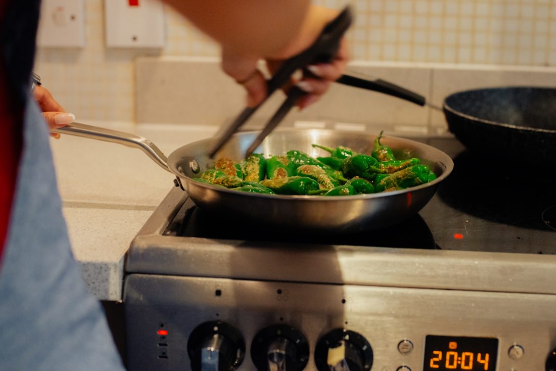 Greens in the pan on the stove